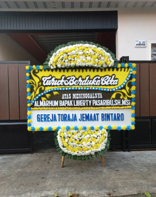 Papan Bunga Duka di Wedi